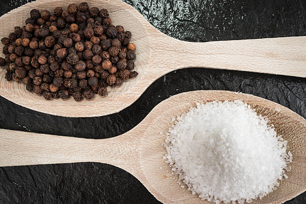 istock Salt and black pepper corns 547442562