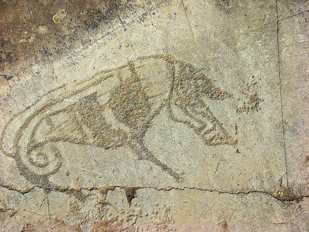 istock Stone with animal petroglyphs 547443124