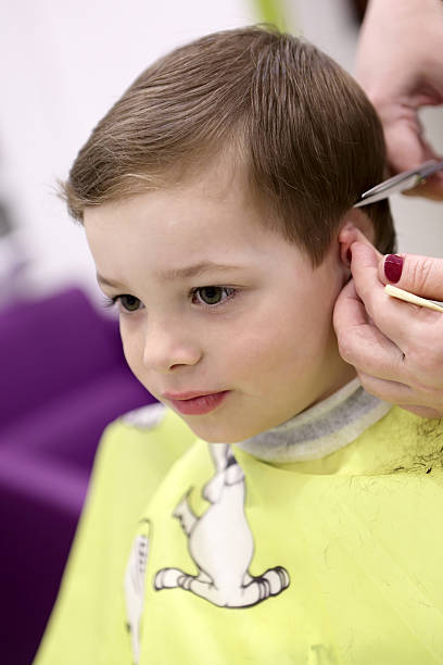 istock Child at the barbershop 547443672