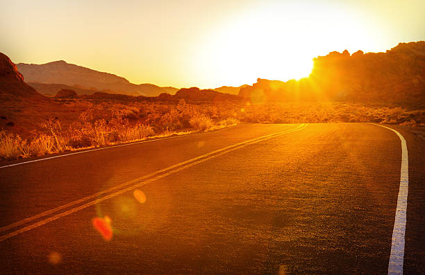 istock Red sunset over road, southern Nevada 547447570