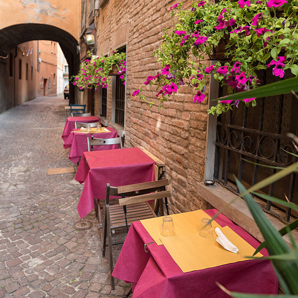 istock Old pub in a tiny alley in Ferrara Italy 547450776
