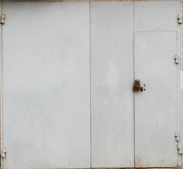 istock old metal warehouse door 547493826