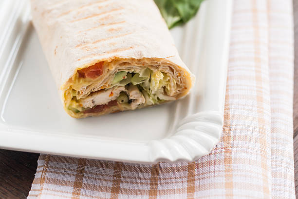 Meat and vegetables in a pita.
