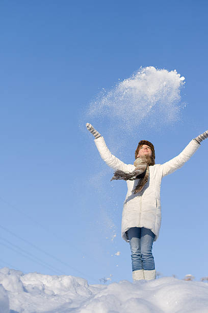 istock red-haired girl having fun on a winter walk 547499126