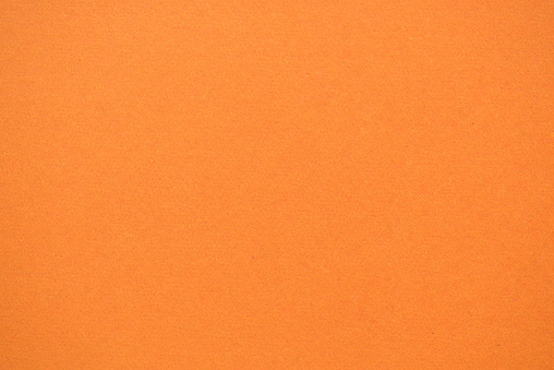 texture of orange color paper background