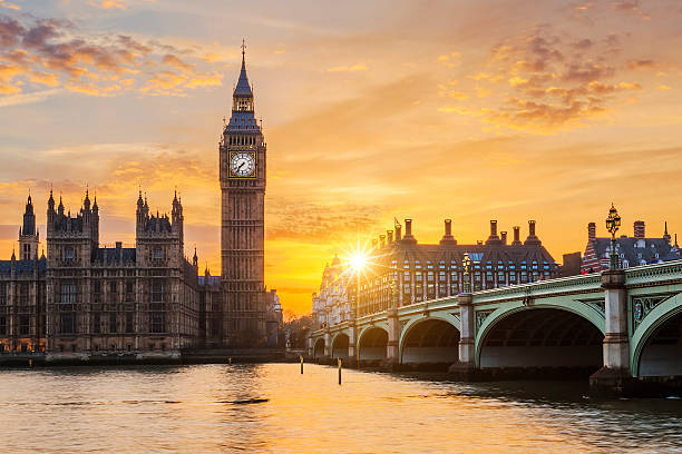 Big Ben and Westminster Bridge at sunset Big Ben and Westminster Bridge at sunset, London, UK houses of parliament london photos stock pictures, royalty-free photos & images