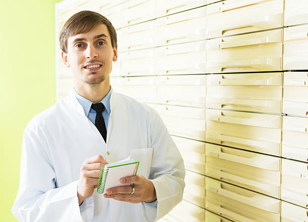 istock Pharmacist posing in pharmacy depot 547499850