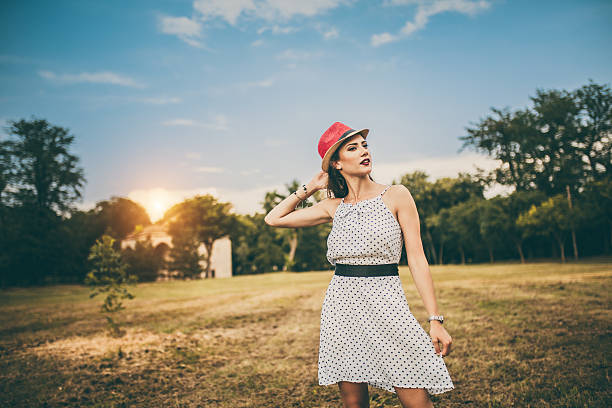 istock Happy girl with hat in nature 547500880