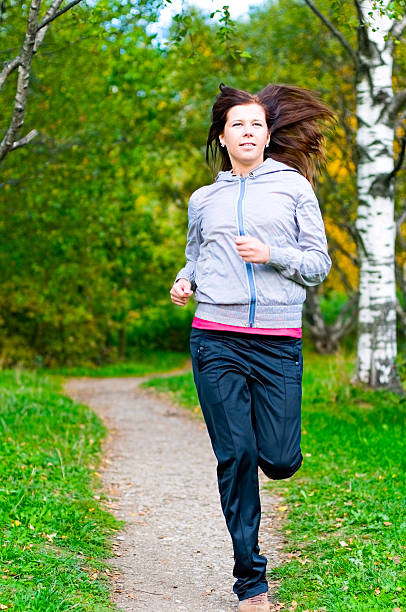 woman running stock photo