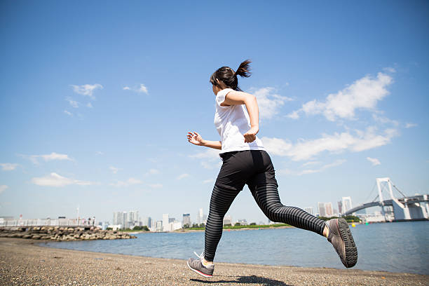 istock Woman running at full speed 547503000