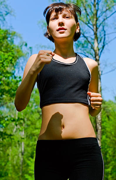 woman running stock photo