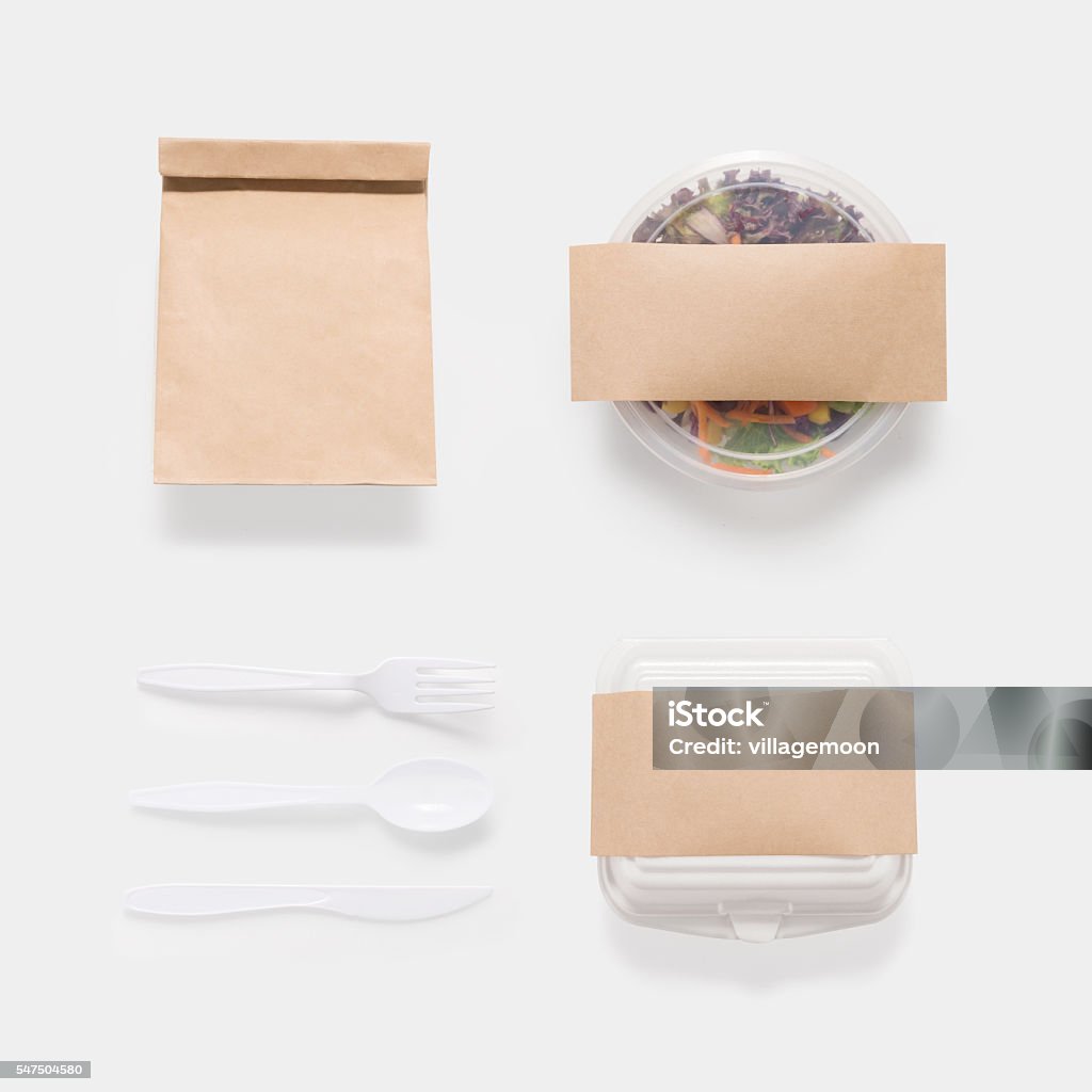 Design concept of mockup salad, bag and container box set Design concept of mockup salad, bag and container box set isolated on white background. Copy space for text and logo. Clipping Path included on white background. Take Out Food Stock Photo