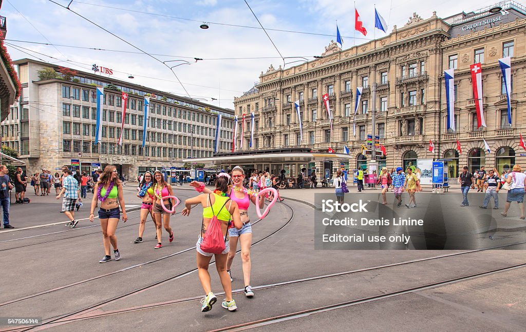 Participants of the Street Parade in Zurich on Paradeplatz square Zurich, Switzerland - 2 August, 2014: participants of the Street Parade in Zurich on Paradeplatz square short before the beginning of the parade. The Street Parade is the most attended technoparade in Europe, it takes place in Zurich, Switzerland. Credit Suisse Stock Photo