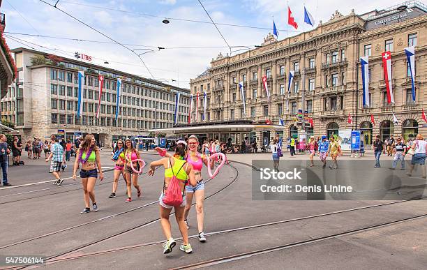 Participants Of The Street Parade In Zurich On Paradeplatz Square Stock Photo - Download Image Now