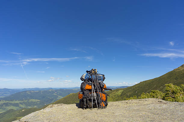 Camping with backpacks in the mountains with views of the mounta