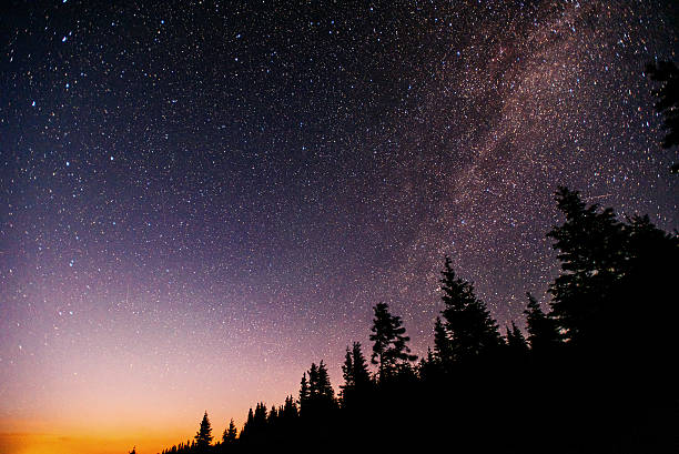 istock fantastic winter meteor shower and the snow-capped mountains 547508648