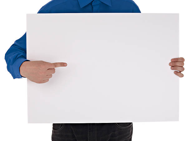 istock man in shirt holding blank sign 547513652