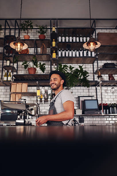 istock Young business owner standing in a cafe 547513946