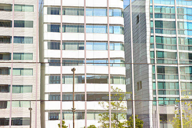 istock Group of buildings that was reflected in the window glass 547515052