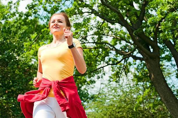 woman running stock photo