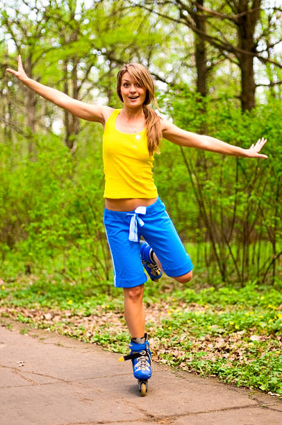 girl on rollers stock photo