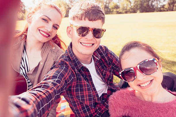istock Best friends making selfies on picnic 547518052