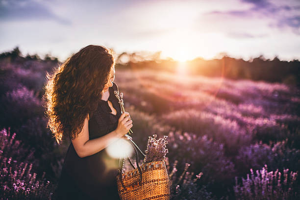 istock young woman in lavander field 547519862