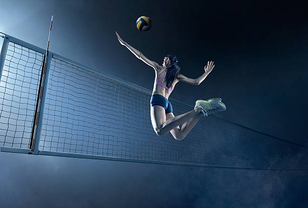 istock Volleyball: Beautiful female player in action 547523704