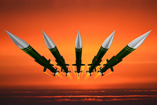 istock Missiles flying in the air, attack, aggression 547524618