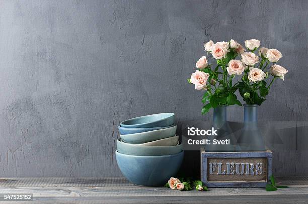 Crocery And Roses Bouquet Stock Photo - Download Image Now - Interior Decor, Kitchen, Dark