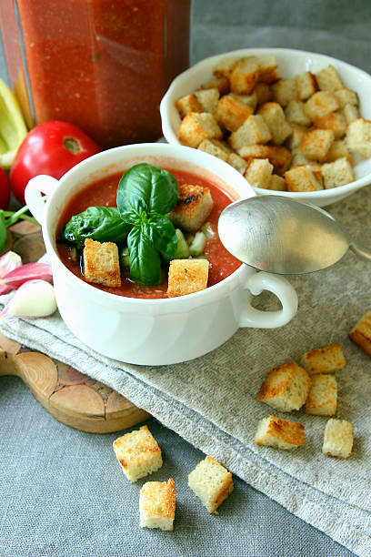 istock plate of gazpacho with croutons.. 547525240