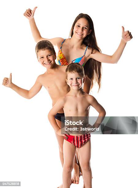 Three Happy Kids In Swimsuit Standing Together Stock Photo - Download Image Now - Family, Swimming, Cut Out