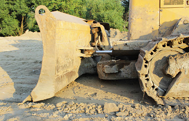 istock blade in the bulldozer and ground 547529346