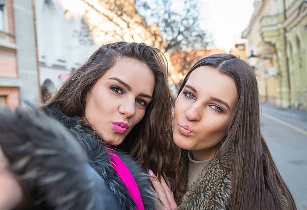 istock girls taking selfie 547531572