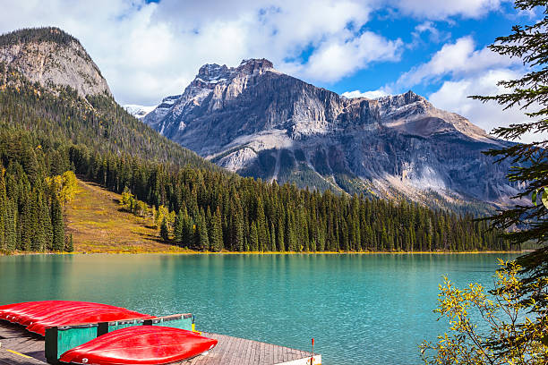 istock Shiny red kayaks are dried upside down 547532774