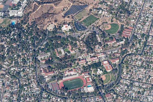 Occidental College A view of Occidental College (Oxy) in the Eagle Rock neighborhood of Los Angeles from 10,000 feet.  The athletic facilities - pool, football field, and tennis courts are in the foreground.  Mount Fuji - with a photovoltaic array - is in the background. eagle rock stock pictures, royalty-free photos & images