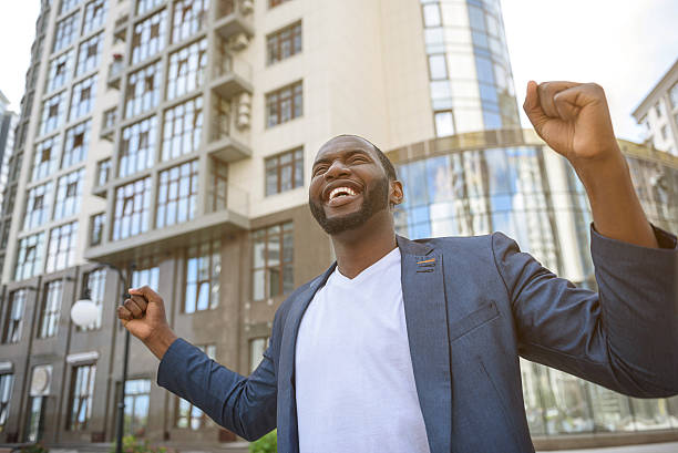 istock Happy young male worker enjoying victory 547534960