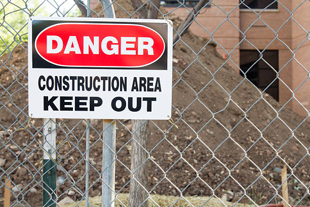 istock Danger Construction Area Keep Out sign on fence 547534966