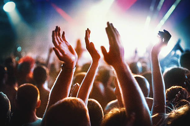 istock People at concert party. 547535250
