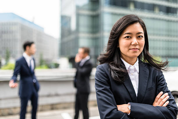 istock Business japanese team standing togetherness 547536710