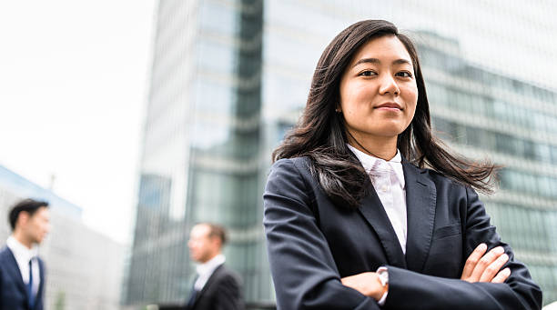 istock Business japanese team standing togetherness 547536748