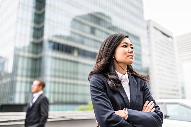istock Business japanese team standing togetherness 547536772
