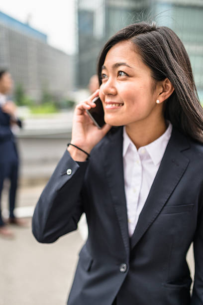 istock Business japanese team standing togetherness 547536876