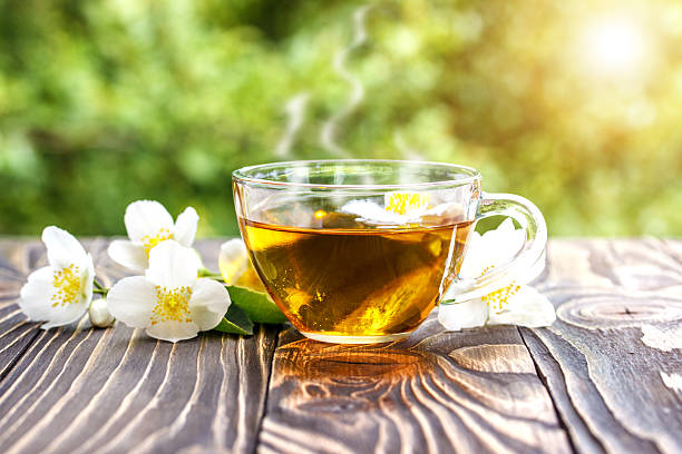 istock jasmine tea and jasmine flowers on  wooden background 547538594