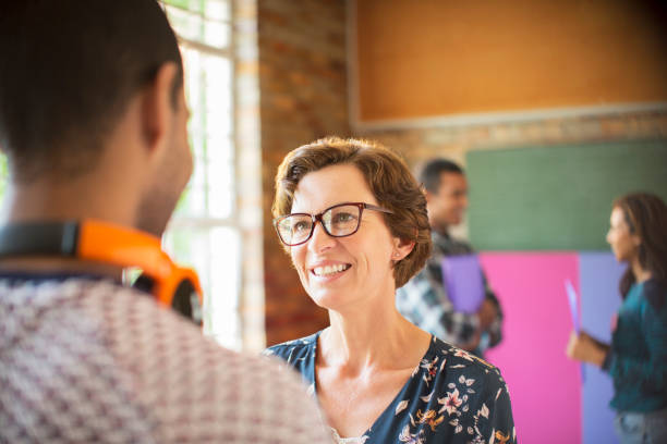 istock People talking at community center 554392177