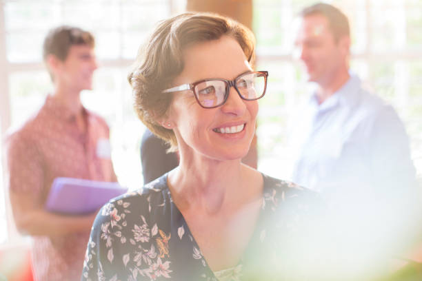 istock Smiling woman looking away 554392185