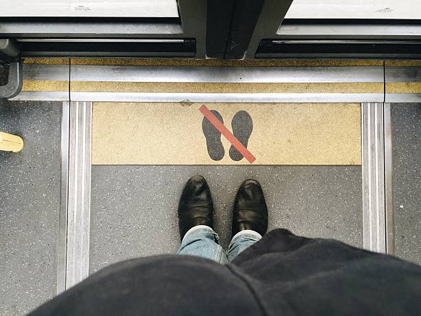 istock Low Section Of Man Standing On Floor 556717515