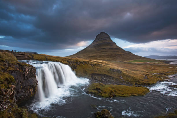 Scenic view of waterfall and landscape, Kirkjufell, Snaefellsnes, Iceland  kirkjufell stock pictures, royalty-free photos & images