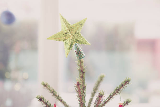 green star on christmas tree, decoration for spruce