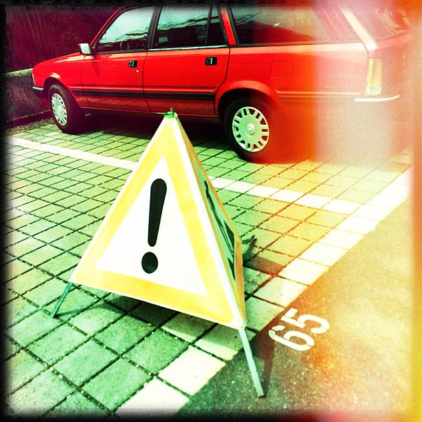 istock Warning Sign On Parking Lot 560255047